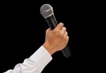 Hand Holding Microphone for speech isolated on black background, Hand Holding Microphone on black With work path.