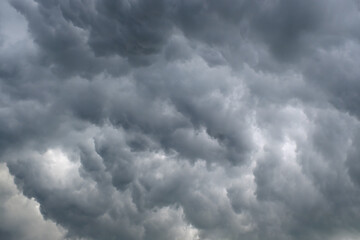 amazing awful dark gray clouds with bright gleams