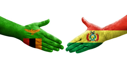 Handshake between Bolivia and Zambia flags painted on hands, isolated transparent image.