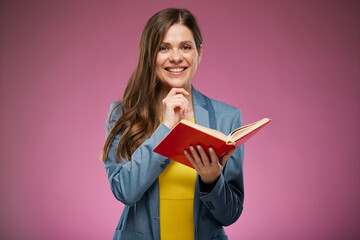 Thinking school teacher touching her chin holding book. Isolated advertising portrait.