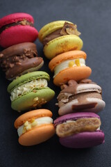 Macaroons in black background