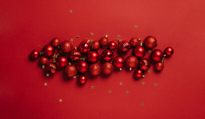 Beautiful red decoration balls Christmas toys red background. Festive mockup Christmas or New Year