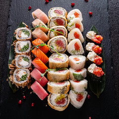 sushi on the black background