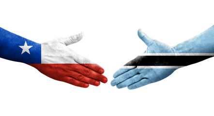 Handshake between Botswana and Chile flags painted on hands, isolated transparent image.