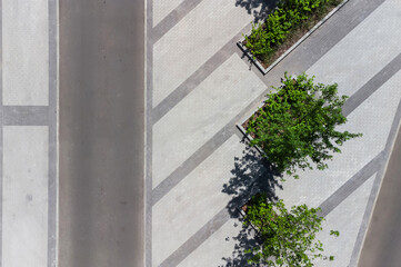 aerial top view of street with parking lot near new residential housing complex