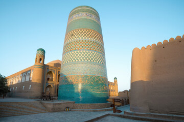 Ancient minaret Kalta Minor on a sunny morning. Khiva, Uzbekistan