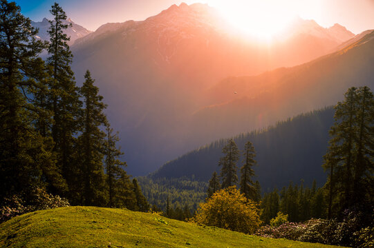 Sunrise in the mountains. These are the scenic meadows of the Parvati valley Himalayan region. Peaks and alpine landscape from the trail of Sar Pass trek, Himalaya, Kasol, Himachal Pradesh, India.	