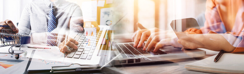 Business team present. professional investor working new start up project. Finance managers meeting.Digital tablet docking screen computer design smart phone using, in morning light