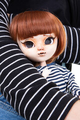 Doll red hairs in child girl hand toy fashion realistic scary plastic game