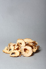 Fototapeta na wymiar pile of apple fritters isolated against gray background