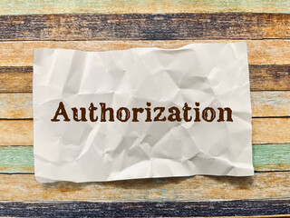 Authorisation word on crumpled paper