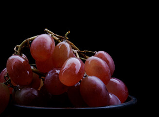 Bunch of ripe red grapes.