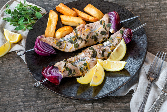 Fish and chips with grilled mackerel kebabs