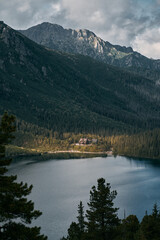 Landscape of a beautiful nature in the European mountains. Charming lake in front of mountain.