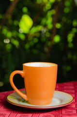 brown coffee cup on a clean table