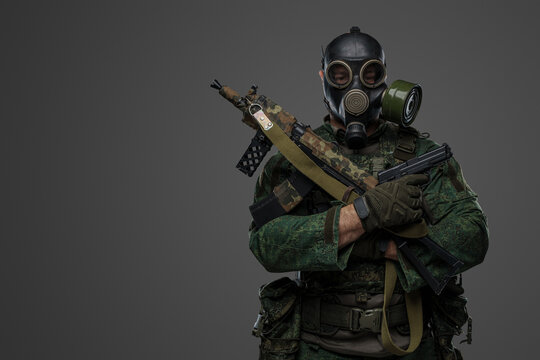 Shot of russian armed forces soldier dressed in uniform and gas mask.