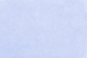 Blue wall as a background. Light blue plaster texture background