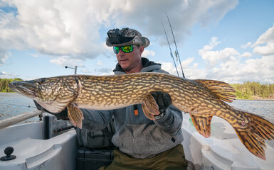 Huge pike caught from the boat