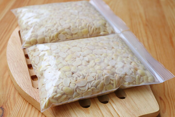 Soybeans Mixed with Tempeh Starter Put in Perforated Zip-top-bags Ready for Fermentation in a Warm Place
