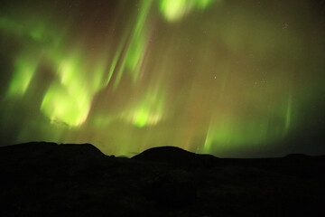 Northen lights over mountains (Lapland, Sweden)