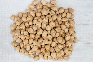 Chick pea, garbanzo bean , dry raw white chana isolated on white background, close up top view