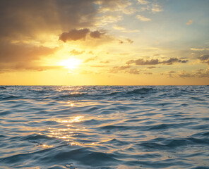 Sea waves and sunset