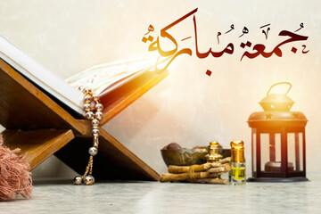 Jumma Mubarak with arabic calligraphy (translation: blessed friday). lantern with perfume holy book...