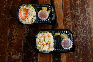 Top view of traditional khmer food packed in single use plastic for delivery