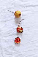 Overhead view of juicy pomegranate fruit showing the concept of springtime, simplicity and slow living