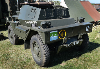 Fototapeta premium Yorkshire wartime experience show. Leeds, UK, August 2022. Military re-enactment event with soldiers, weapons, vehicles, tanks and armor. Axis and allied forces. An historical lifestryle event.