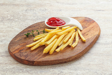 French fried potato over board