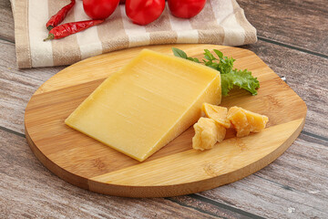 Parmesan hard cheese with small pieces