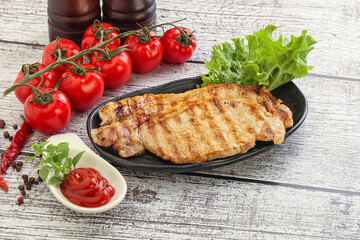 Grilled pork steak with ketchup