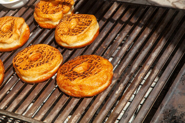 Fresh donuts roasting on the grill
