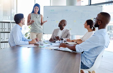 Black woman, speaker and corporate presentation in the office conference room for the team. Diversity, leadership and business people planning a company project with professional leader in a meeting.