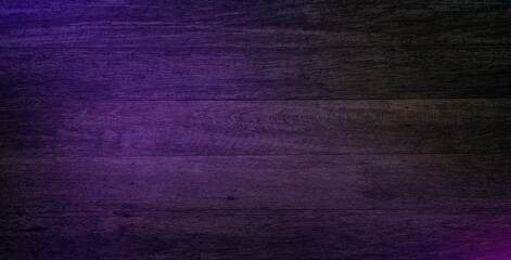 Background or texture of a wooden board in neon light