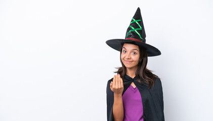 Young hispanic woman dressed as witch over isolated background inviting to come with hand. Happy that you came