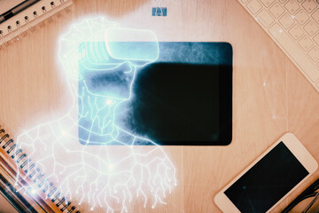 Double exposure of drawing man in AR glasses over table with phone. Top view. VR concept.