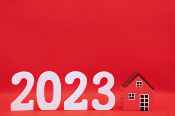 New House 2023 on ฺRed  background - new year trend 2023 - red pattern business concept of Real Estate, Home Property for Sale and rent - copy space , promotion design advertise