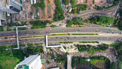 Aerial view of pedestrian bridge that is in the corner of the city of jakarta