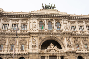 Fototapeta premium Quadriga at the top of Palace of Justice seat of Supreme Court of Cassation (Corte di Cassazione), majestic building on the Tiber River. 