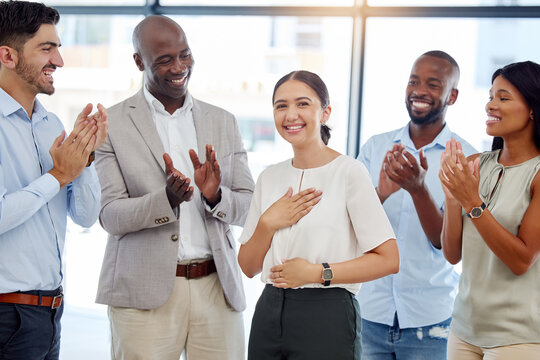 Team success, company clapping and happy woman employee smile at a office. Portrait of a person from Spain feeling support, celebration and motivation with a corporate crowd making a teamwork target
