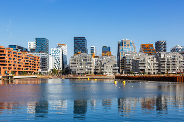 Fototapeta na wymiar Oslo skyline modern city architecture buildings in new Bjorvika District in Norway