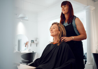 Hairdresser, beauty and senior happy customer at a salon for a makeover, lifestyle change in New...