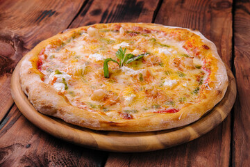 Shrimp pizza with different types of cheese