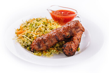 Moldavian Traditional Mititei Mici Meat Sticks with Cabbage and a Sauce