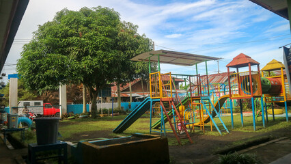 Fototapeta na wymiar Tondano, Indonesia - October 10, 2022, children playing in the early childhood school playground
