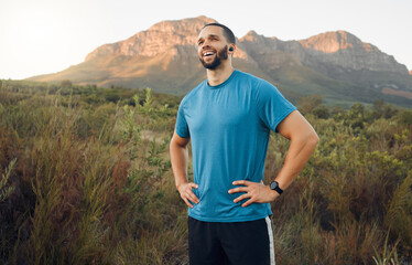 Nature, fitness and black man on hike with view, break while exercise outdoors and active lifestyle. Cardio, sport and physical activity, health motivation and endurance, happy and satisfaction.