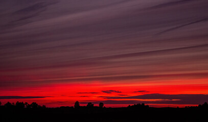 Last sunset of September, patterned colored evening sky.