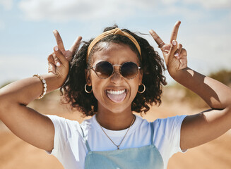 Peace, portrait and happy gen z girl on summer holidays, vacation or having fun on a weekend outdoors. Freedom, traveling and young woman with cool, trendy and swag with a v hand sign in Las Vegas